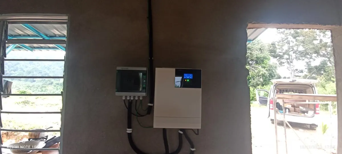 Off-grid inverter and control unit mounted on a wall