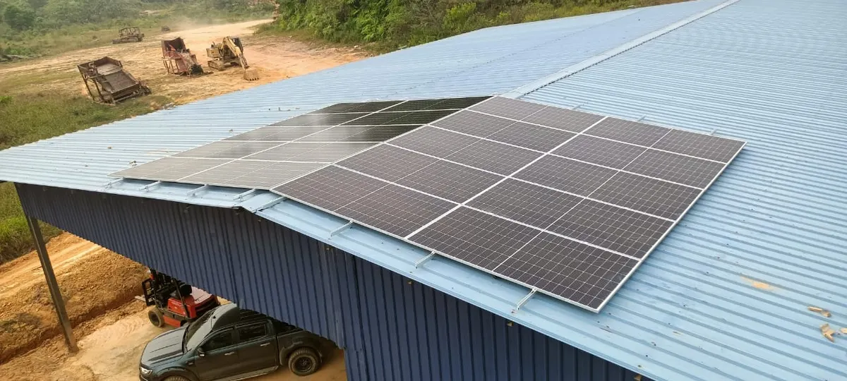 Solar array on the metal roof of a large building